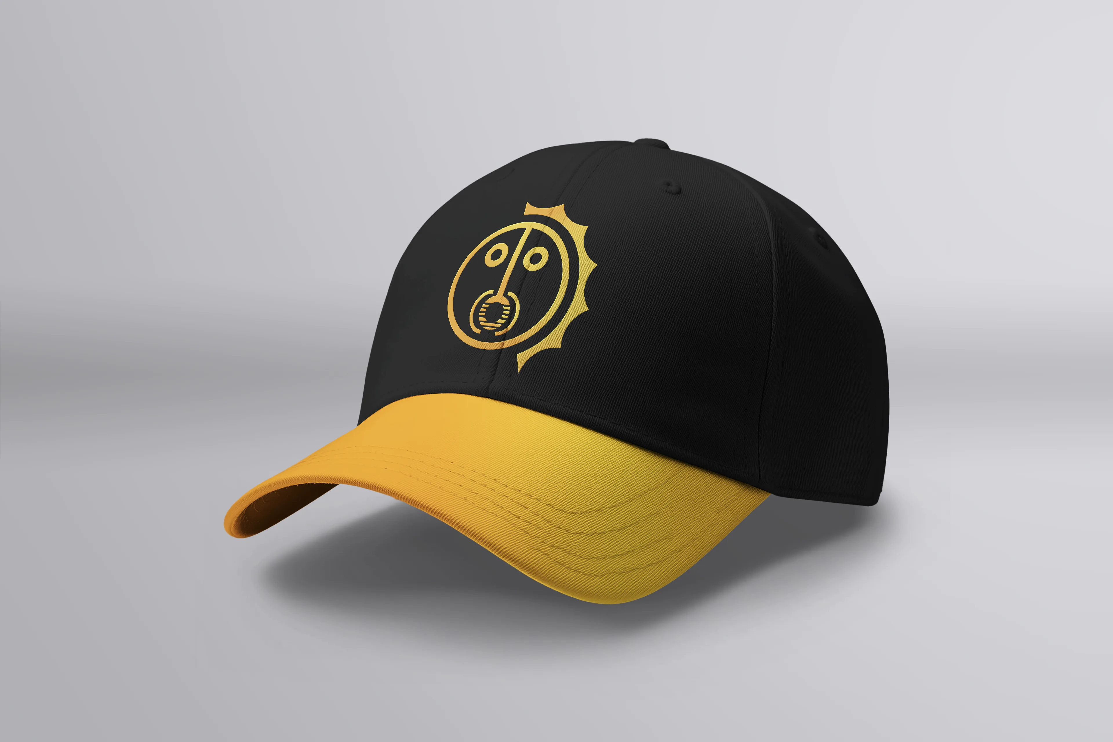 Ahau Solar — boné preto e amarelo com o símbolo solar