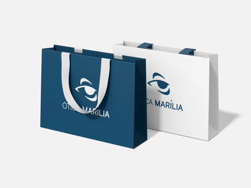 Ótica Marília — sacolas oficiais da marca em azul e branco